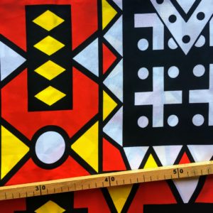 Tissu Wax rouge jaune noir imprimé Samakaka
