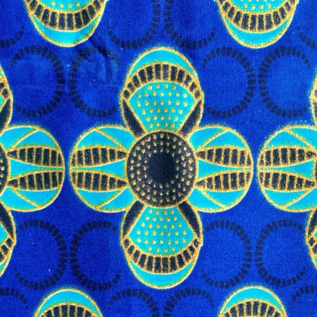 Tissu Wax pailleté bleu doré imprimé Fleurs détail