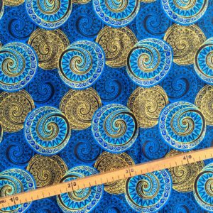 Tissu Wax pailleté bleu doré imprimé Spirales