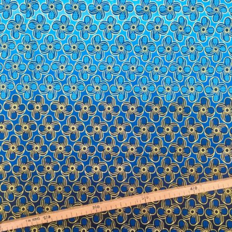Tissu Wax pailleté dégradé bleu doré imprimé Fleurs