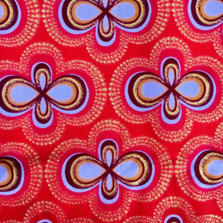 Tissu Wax pailleté dégradé rouge orangé doré imprimé Infini détail couleur