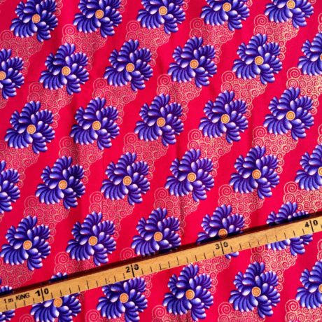 Tissu Wax pailleté fuchsia foncé violet doré imprimé Floral