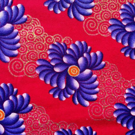 Tissu Wax pailleté fuchsia foncé violet doré imprimé Floral détail