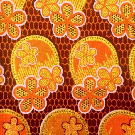 Tissu Wax pailleté jaune orangé marron imprimé 3 Fleurs détail foncé