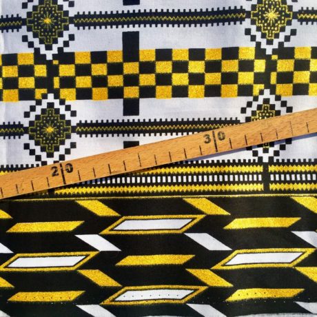Tissu Wax pailleté noir blanc doré imprimé Kente détail bordure