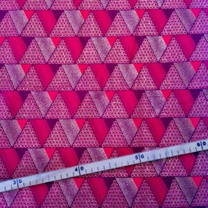 Tissu Wax pailleté rouge bordeaux doré imprimé Triangles