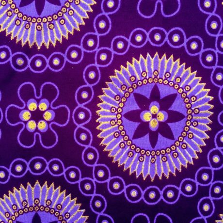 Tissu Wax pailleté violet doré imprimé Fleurs encerclées détail