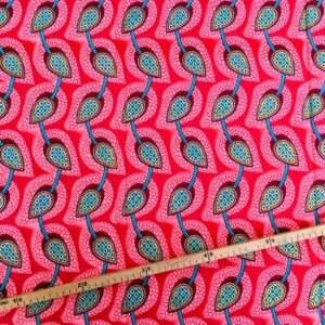 Tissu Wax pailleté corail imprimé Tulipes
