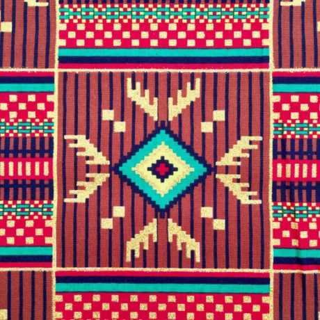 Tissu Wax pailleté marron vert rouge imprimé Amérindien détail