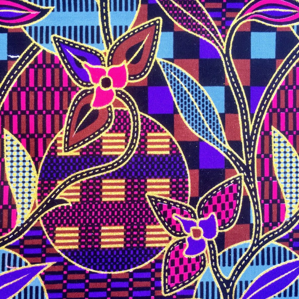 Tissu Wax pailleté multicolore imprimé Batik détail