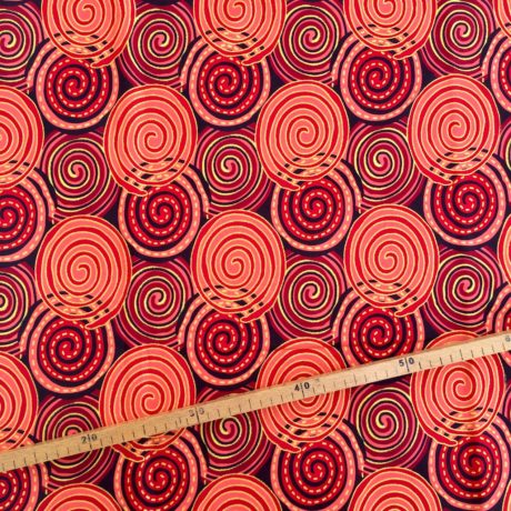 Tissu Wax pailleté rouge bordeaux imprimé Spirales
