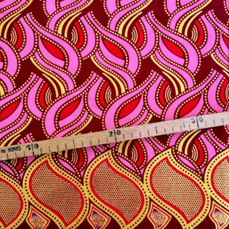 Tissu Wax pailleté rouge doré imprimé Tresses détail bordure