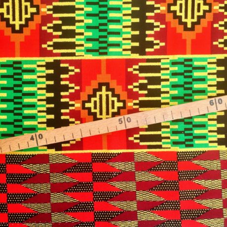 Tissu Wax pailleté rouge vert imprimé Aztèque détail bordure