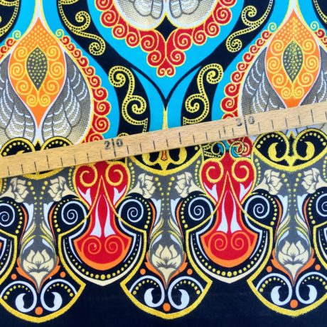 Tissu Wax pailleté turquoise orange imprimé Lanna détail bordure