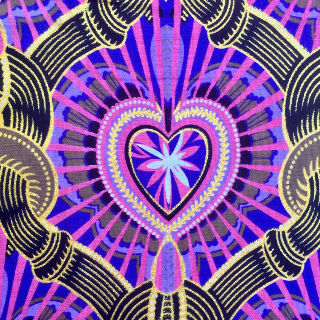Tissu Wax pailleté violet imprimé Coeur détail