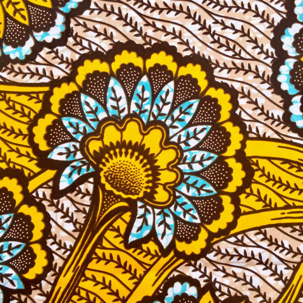 Tissu Wax marron jaune turquoise imprimé Floral détail