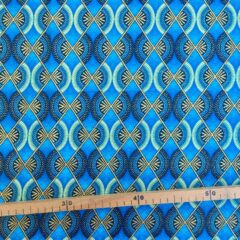 Tissu Wax pailleté bleu turquoise imprimé Demi-lunes