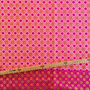 Tissu Wax pailleté fuchsia orangé imprimé Celte