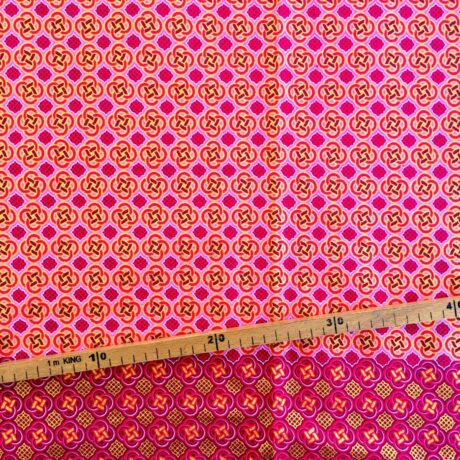 Tissu Wax pailleté fuchsia orangé imprimé Celte