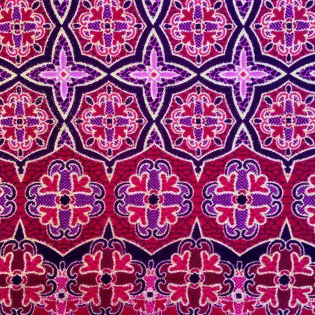 Tissu Wax pailleté rouge imprimé Tuiles détail bordure