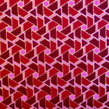 Tissu Wax pailleté rouge imprimé Mini triangles détail