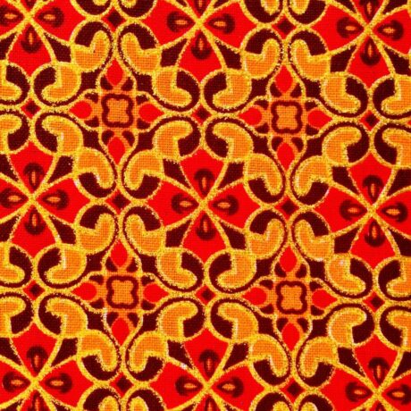 Tissu Wax pailleté rouge orangé imprimé Croix florale détail