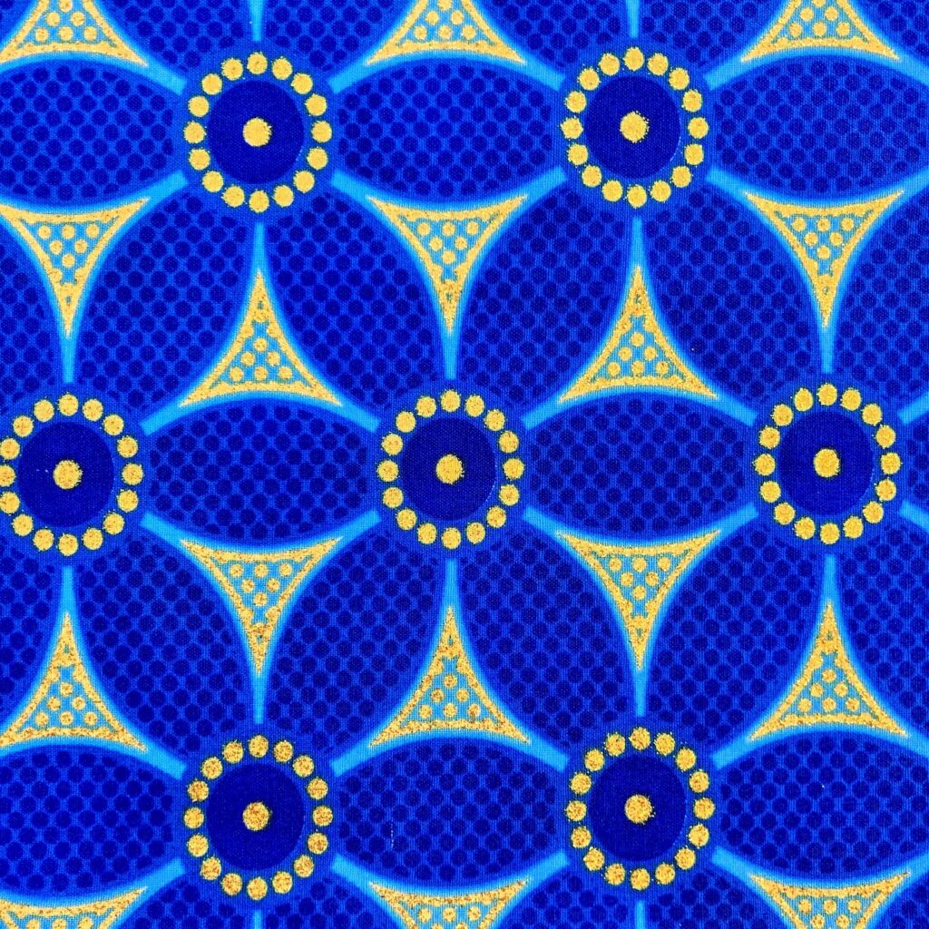 Tissu Wax pailleté bleu imprimé Fleur de Vie détail