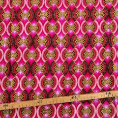 Tissu Wax pailleté rose imprimé Demi-lunes