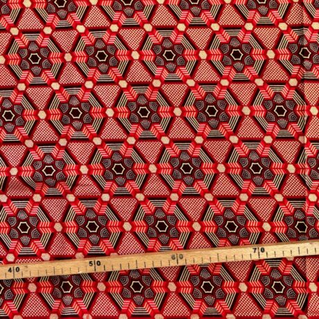 Tissu Wax pailleté rouge imprimé Flocons