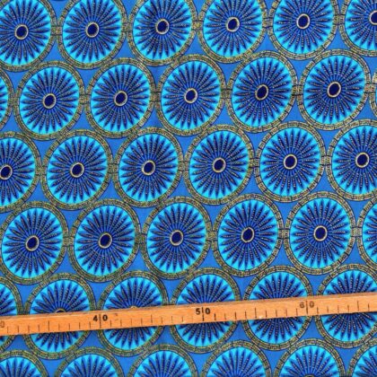 Tissu Wax pailleté bleu turquoise imprimé Rosaces