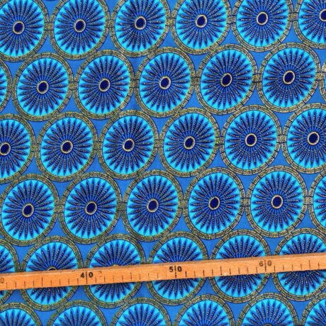 Tissu Wax pailleté bleu turquoise imprimé Rosaces