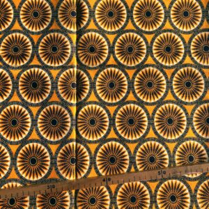 Tissu Wax pailleté jaune orangé imprimé Rosaces
