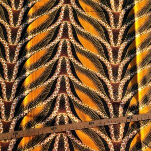 Tissu Wax pailleté jaune orangé imprimé Sirène