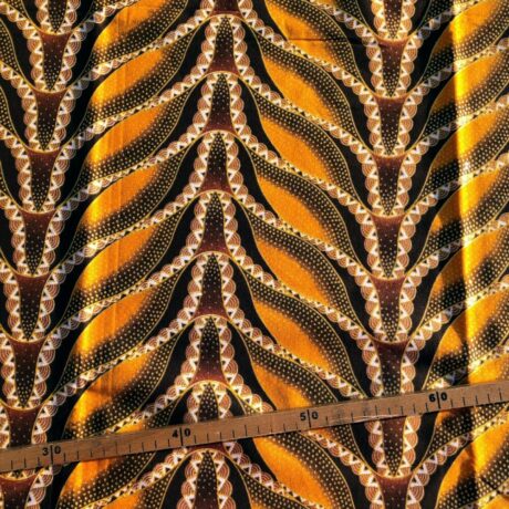 Tissu Wax pailleté jaune orangé imprimé Sirène