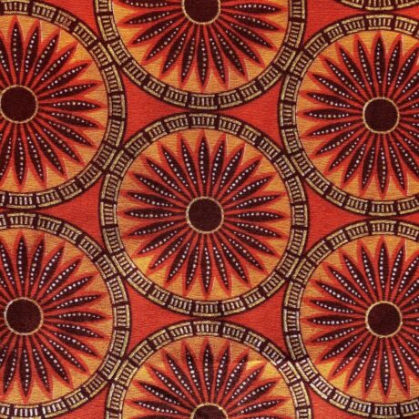 Tissu Wax pailleté orange imprimé Rosaces détail
