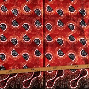 Tissu Wax pailleté rouge imprimé Courbes