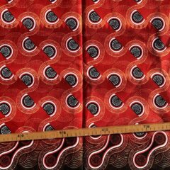 Tissu Wax pailleté rouge imprimé Courbes