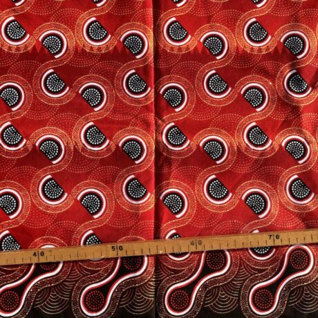Tissu Wax pailleté rouge imprimé Courbes