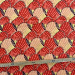 Tissu Wax pailleté orange imprimé Clams