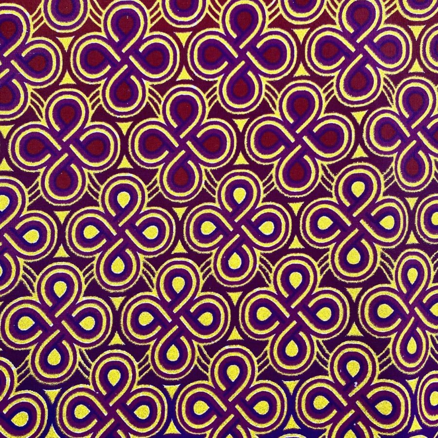 Tissu Wax pailleté rouge bordeaux imprimé Noeuds détail bordure