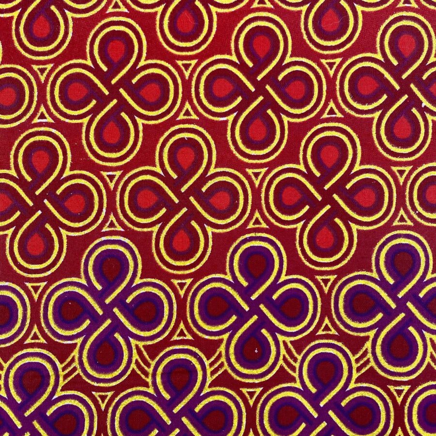 Tissu Wax pailleté rouge bordeaux imprimé Noeuds détail