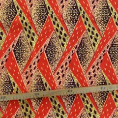 Tissu Wax pailleté orange imprimé Croisé