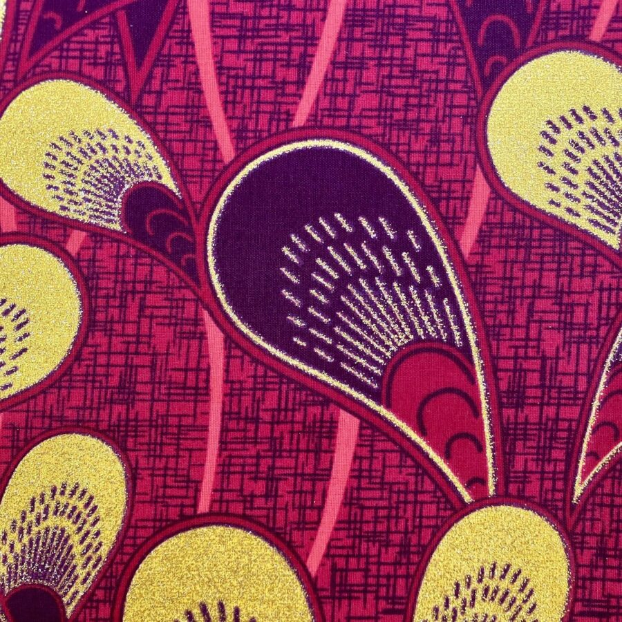 Tissu Wax pailleté rouge imprimé Moules détail